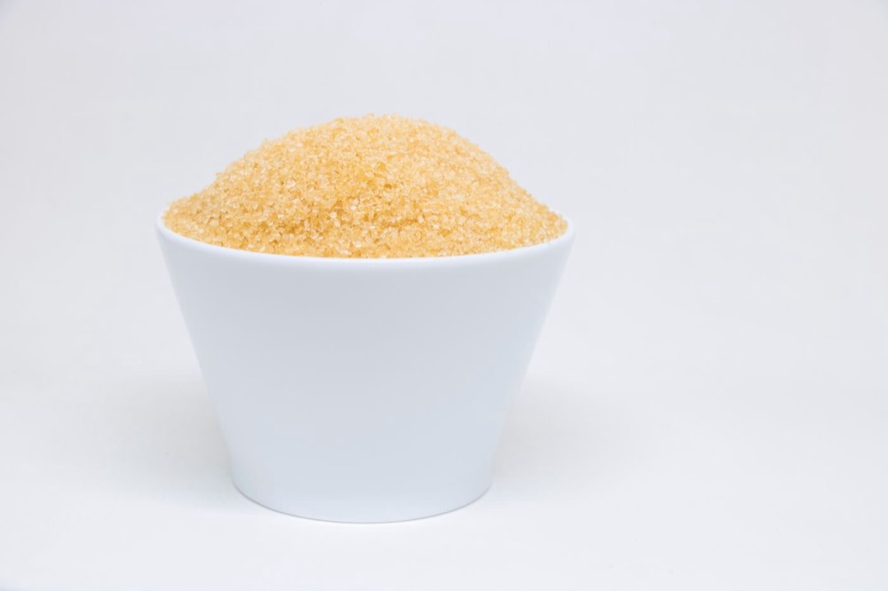 Jaggery powder in a white bowl