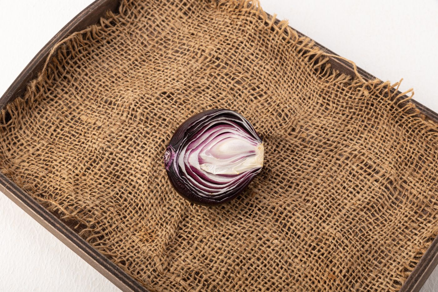 Sliced red onion on burlap
