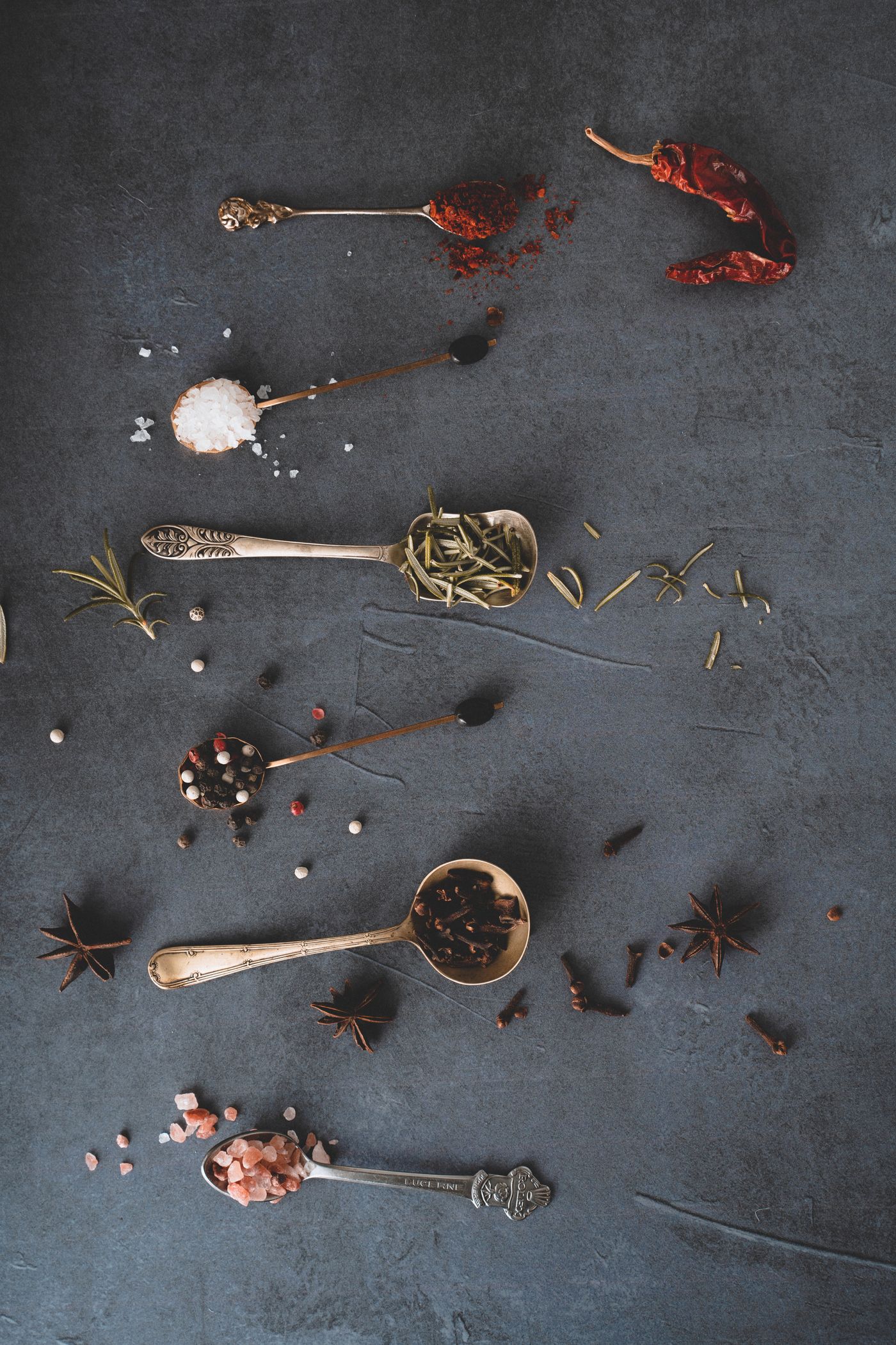 Whole spices on spoons